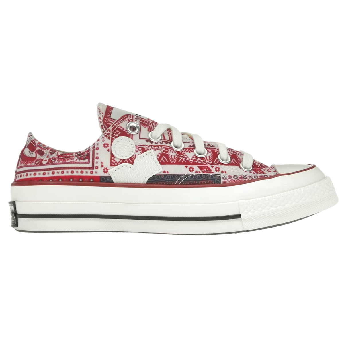 Converse Chuck 70 Low Isabel Marant Vanilla Ice Red sneakers, set fra siden med cremefarvet lærredsoverdel og røde detaljer ved sålekanten