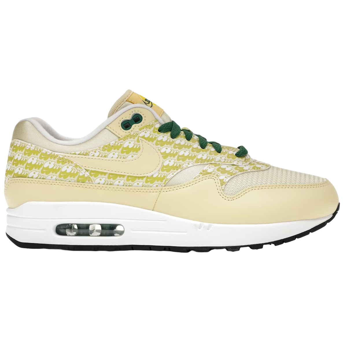 Nike Air Max 1 Lemonade sneakers i sideprofil med citronfarvet læderoverdel, reflekterende mønstre og den ikoniske grønne Swoosh