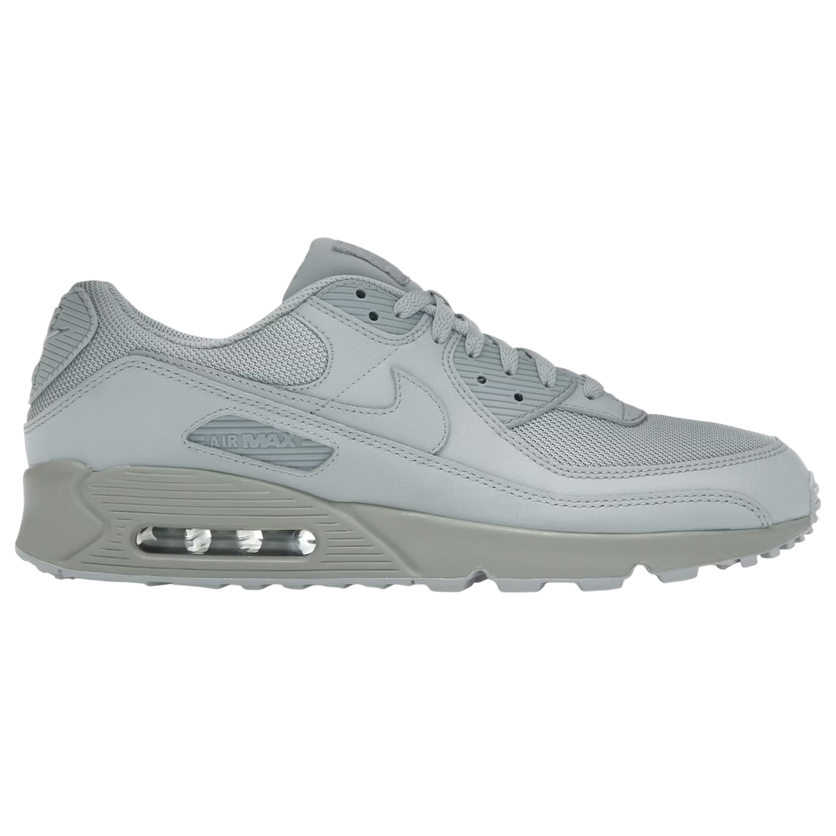 Nike Air Max 90 Wolf Grey sneakers i sideprofil med grå overdel i læder og mesh, hvide snørebånd samt den klassiske synlige Air-enhed i hælen.